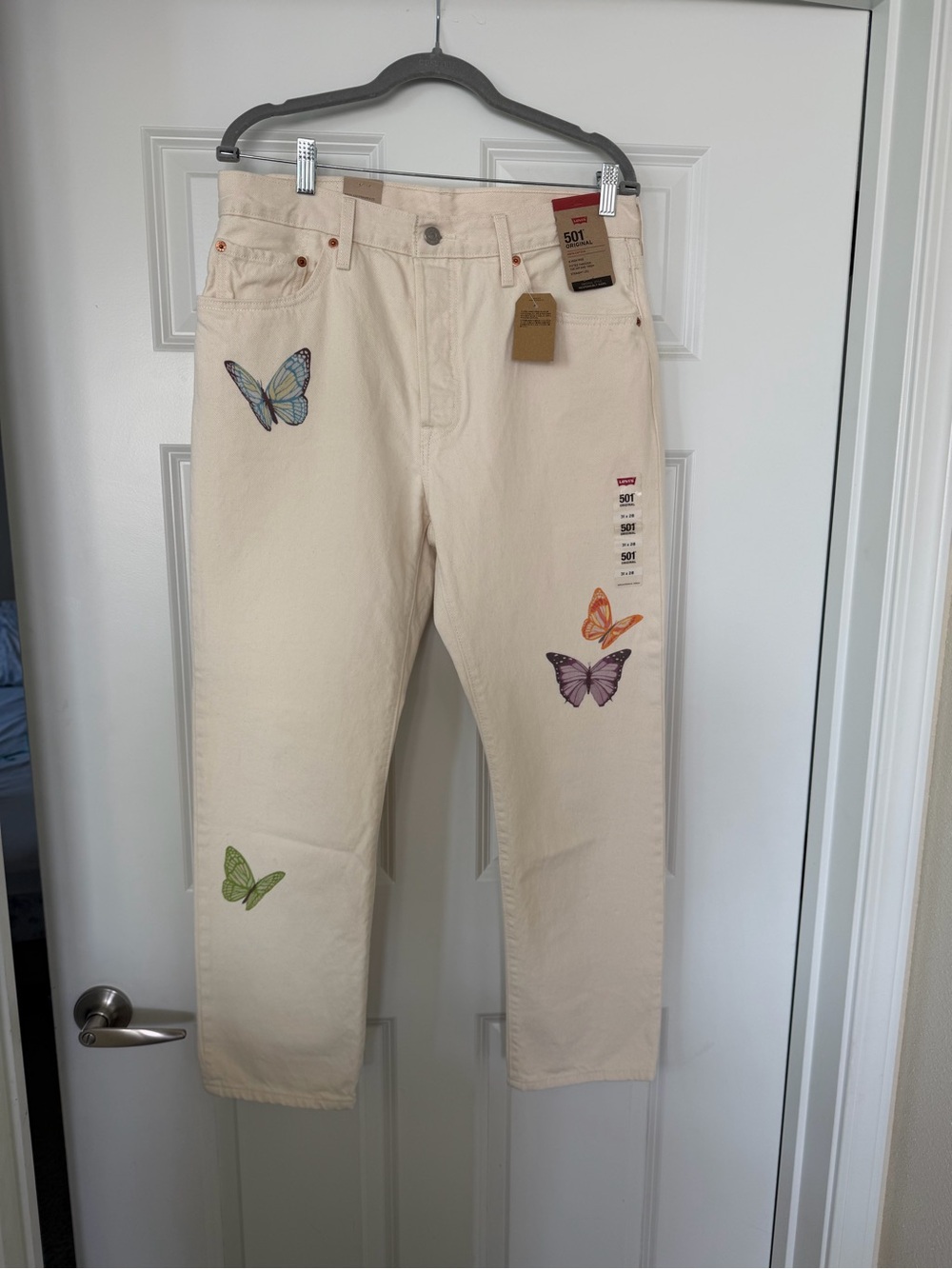 Levi's Straight Cream Jeans with Colorful Butterfly Motifs